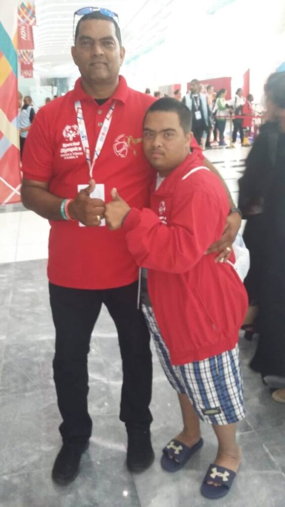 Rohan Singh stands with his son Special Olympian Bernard Singh while visiting Abu Dhabi for the Special Olympics in 2019. 

PHOTO COURTESY ROHAN SINGH
