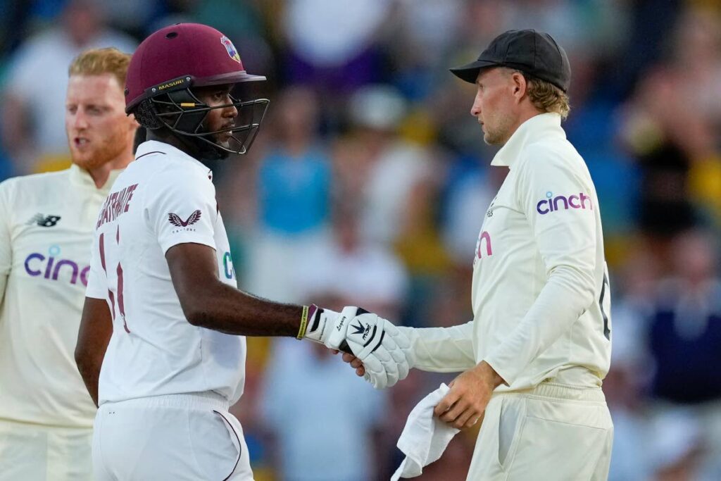 In this photo taken on Sunday, England's captain Joe Root, right, shakes hands with West Indies' captain Kraigg Brathwaite at the end of day five of their second Test match at the Kensington Oval in Bridgetown, Barbados. The third match begins on Thursday.  - (AP PHOTO)