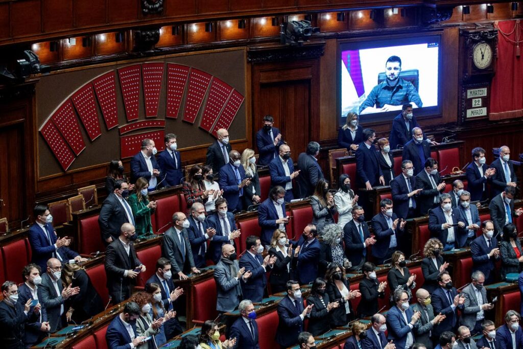 Ukrainian President Volodymyr Zelensky addresses the Italian parliament via video link, in Rome, Tuesday. (Roberto Monaldo/LaPresse via AP) - 