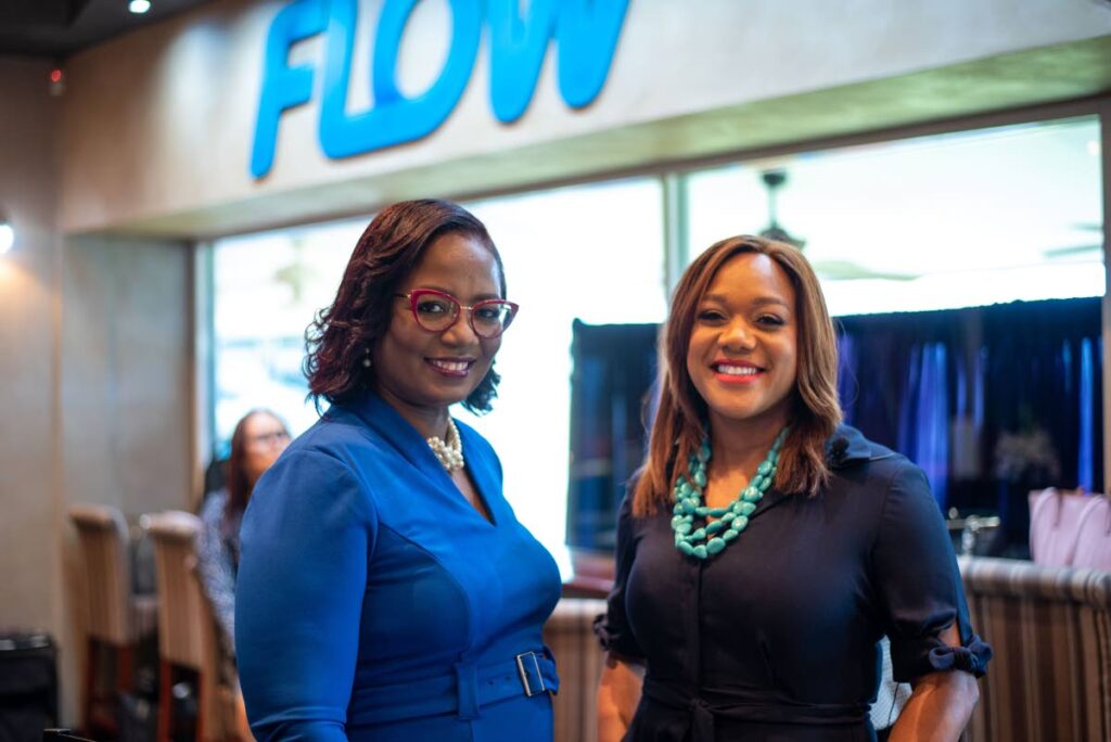 Simone Martin-Sulgan, Flow vice president, right, and Yolande Agard-Simmons, Flow communications manager. Photo courtesy Flow - 