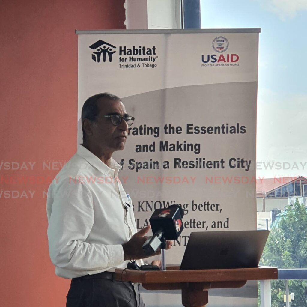 Dr Asad Mohammed delivers the city action plan at the Port of Spain City Hall on Friday.  Photo by Cherisse L Berkeley