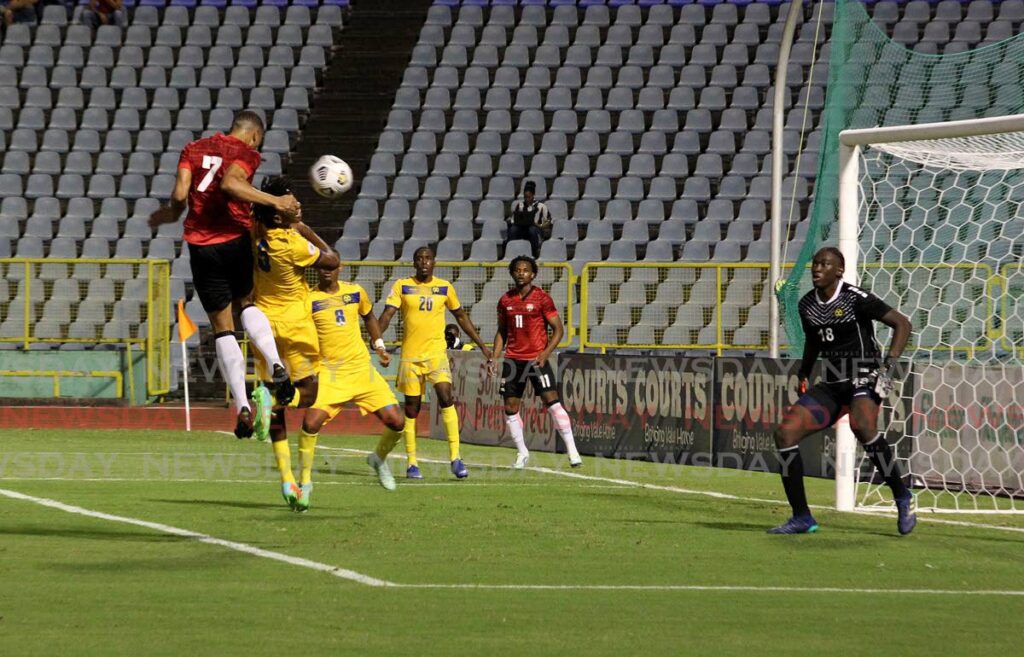 Trinidad and Tobago's Ryan Telfer rises for a header against Barbados in the Caribbean Classic at the Hasely Crawford Stadium, Mucurapo.  - ROGER JACOB