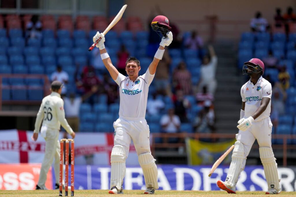 West Indies' Joshua Da Silva celebrates after he scored a century against England during day three of their third Test at the National Cricket Stadium in St. George, Grenada, on Saturday. 