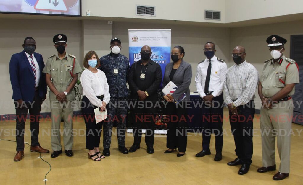 Chairman of the National Road Safety Council Sonia Francis-Yearwood (centre) - permanent secretary at the works ministry, alongside McDonald Jacob Commissioner of Police, Sharon Inglefield of Arrive Alive and Chief Fire Officer Arnold Bristo, with members of the National Safety Council at the Ministry of Works and Transport,
Richmond Street, Port of Spain on Monday. Photo by Roger Jacob