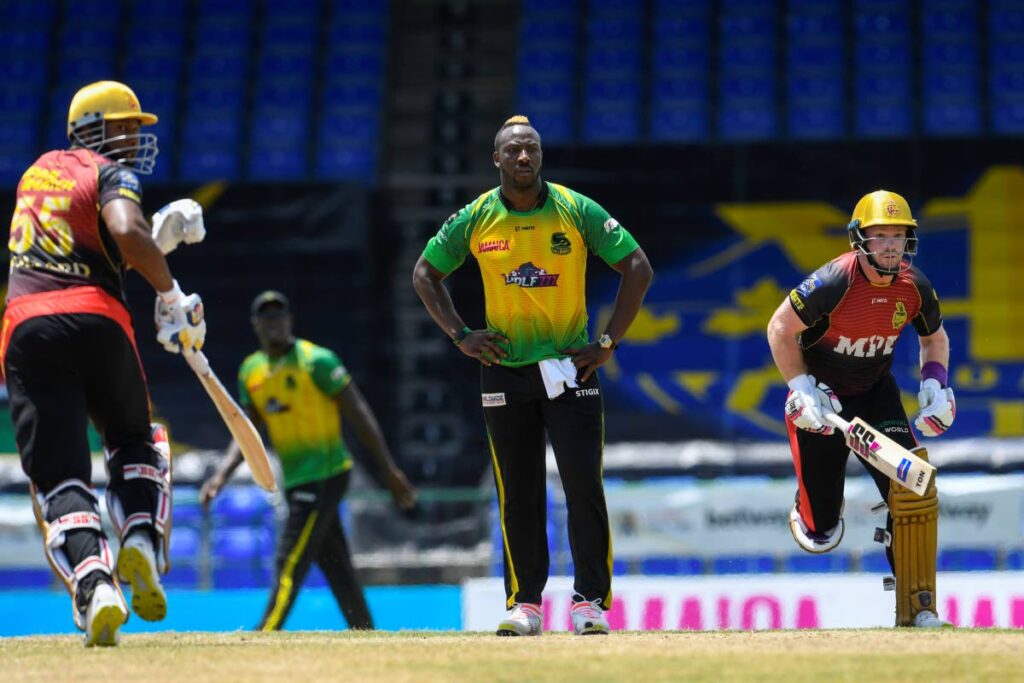 In this Sep 7, 2021 file photo, Andre Russell (C) of Jamaica Tallawahs expresses disappointment as Tim Seifert (R) and Kieron Pollard (L) of Trinbago Knight Riders run during the 2021 Hero Caribbean Premier League match 19 at Warner Park Sporting Complex. Russell has been signed by TKR for the 2022 edition of the CPL.  - Photo courtesy CPL T20