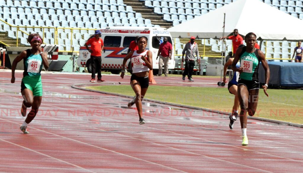 Shaniqua Bascombe of Cougars, sprints her way to victory, in the Girls Under-20 100 metres, during the NAAATT Preparation Meet, at the Hasely Crawford Stadium, Mucurapo on January 30. - Angelo Marcelle