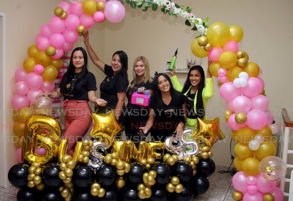 Balloon artists DeiIyn Bracho, Joelyn Guzman, Ivonne Rojas, Jennifer Martinez and Beatriz Antequera. - SUREASH CHOLAI