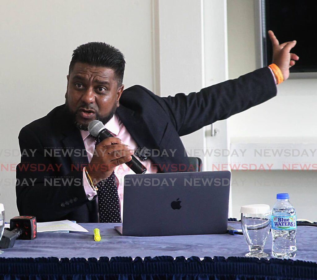 MY POINT IS: Attorney Gerald Ramdeen makes a point duing his press conference on Thursday at the Trinidad Hilton. PHOTO BY ROGER JACOB - 