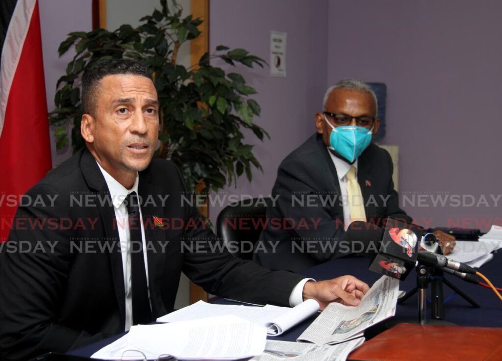  UNC Senator David Nakhid and Couva South MP Rudranath Indarsingh address the media at the Opposition's media briefing on Sunday. Photo by Ayanna Kinsale