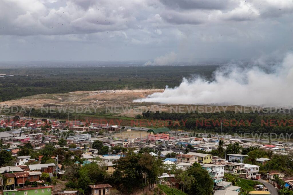 Thick smoke from a fire at the Beetham Landfill affected the neighbouring communities on the outskirts of the capital Port of Spain. - JEFF K MAYERS