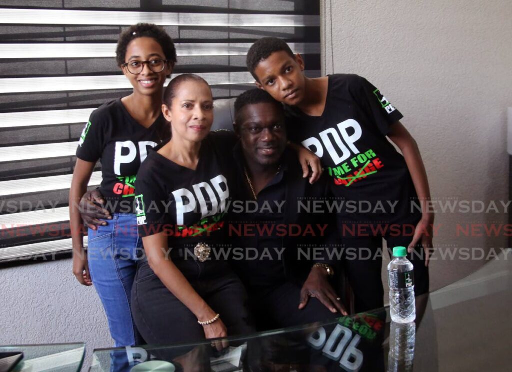 THE DUKE FAMILY: PDP leader Watson Duke with his wife Kim and their son and daughter at the opening of the new office. PHOTO BY SUREASH CHOLAI - 