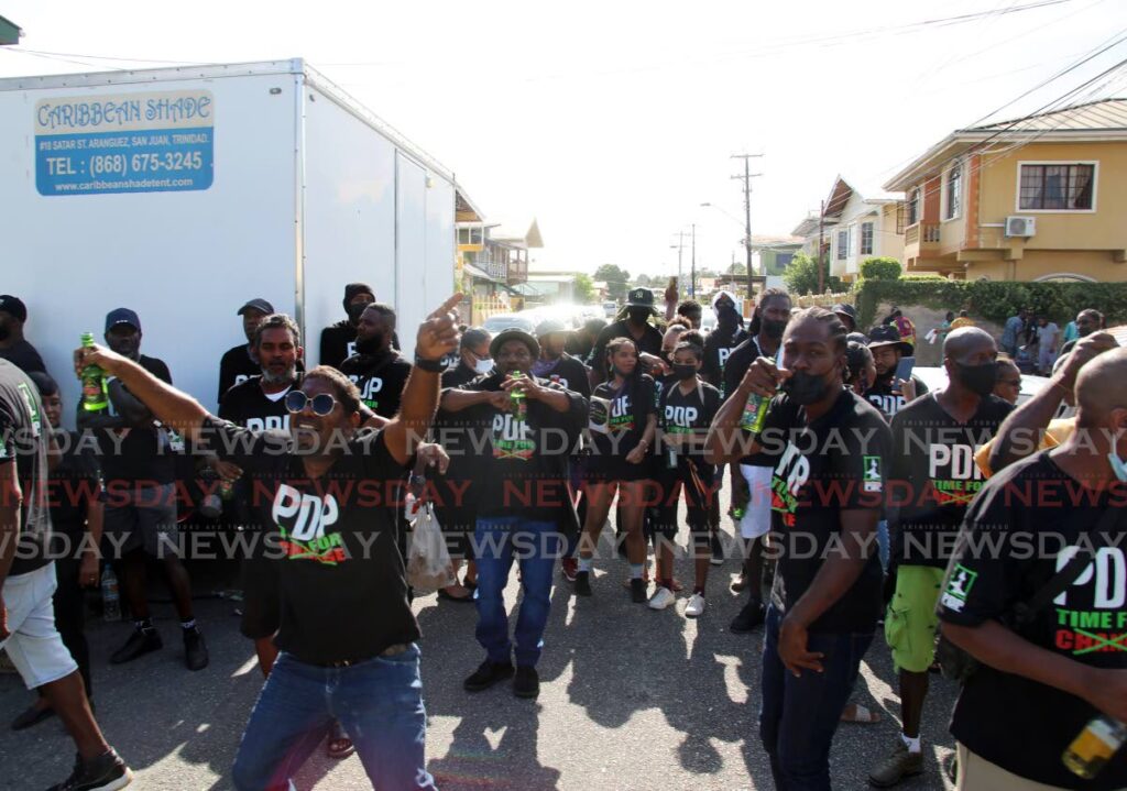 The Progressive Democratic Patriots (PDP) party supporters at the launch of their new Trinidad headquarters on Second Street in Barartaria, last Sunday. Photo by Sureash Cholai