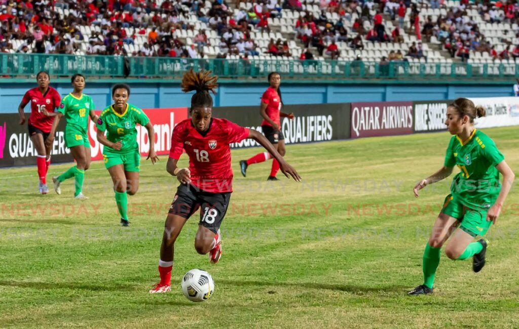 TT's Maria Frances-Serrant (18) controls the ball against Guyana, during the Concacaf World Cup qualifier, on Tuesday, at the Dwight Yorke Stadium. Photo by David Reid