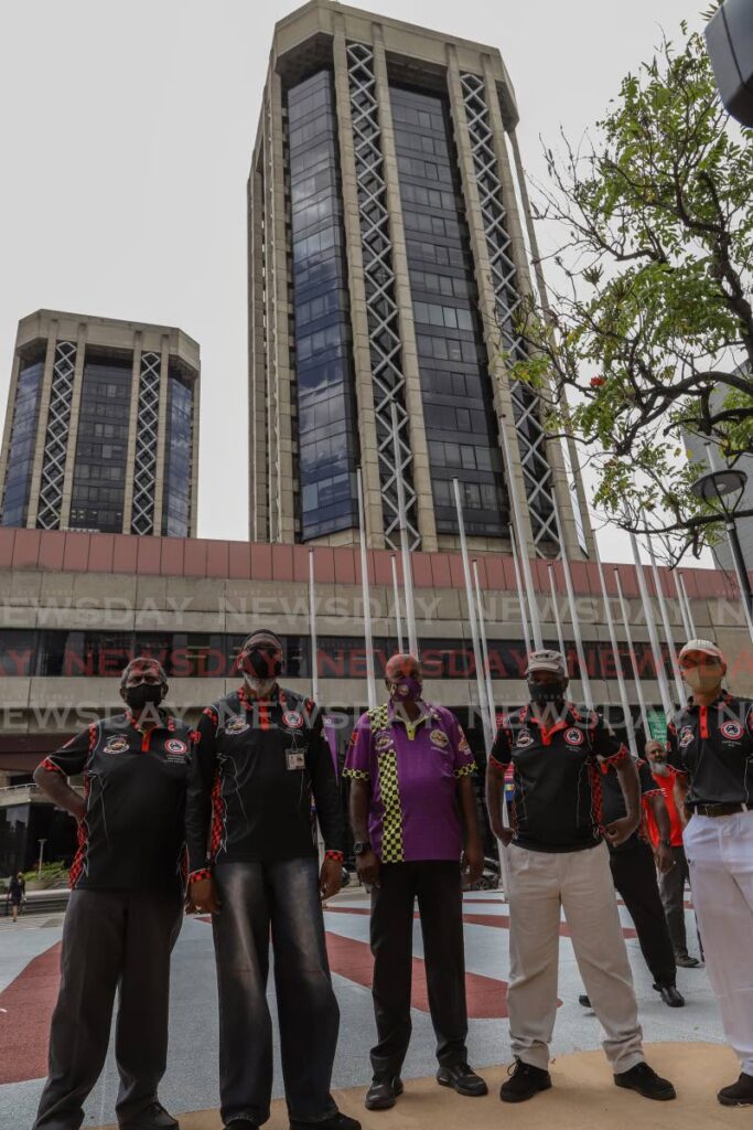 Members of the TT Taxi Drivers Network on the Brian Lara Promenade, Port of Spain where the spoke to the media against the hike in fuel price on April 19. Photo by Jeff Mayers