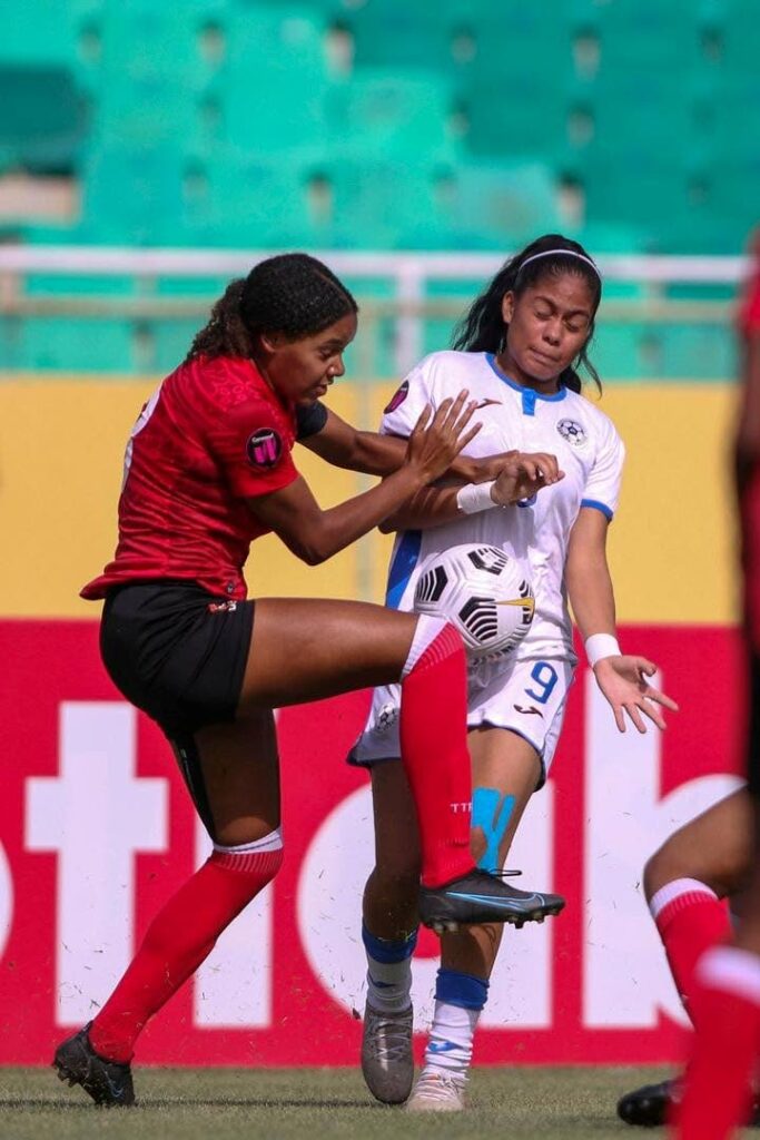 In this 2022 file photo, TT's Marley Walker (left) and Nicaragua's Adriana Munguia vie for the ball during the Under-17 Concacaf Women's Championship Group C match, at the Felix Sanchez Olympic Stadium, in Santo Domingo, Dominican Republic. - Photo courtesy TTFA Media