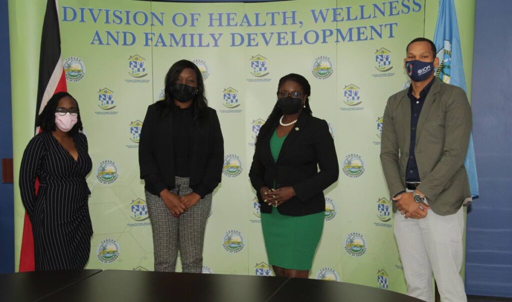 THA health secretary Dr Faith BYisrael, second from right, with the IOM team including (from left) Tinestia Haynes, case co-ordinator; Jewel Ali, head of office, and Zeke Beharry, project officer, at the division in Scarborough on Tuesday.
 - THA