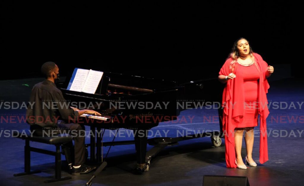 Clarice Beeput sings Si Mes Vers Avaient des Ailes in the vocal solo (upper voices) category at Queen's Hall in Port of Spain on Tuesday. - ROGER JACOB