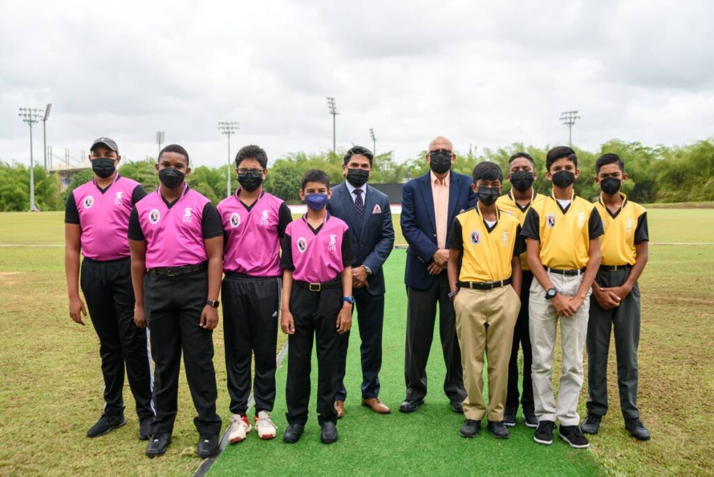 Director of the Scotiabank Foundation Peter Ghany, fifth from left, along with president of the TT Cricket Board Azim Bassarath, fifth from right, with cricketers at the launch of the Scotiabank NextGen Under-13 Cricket Development Programme at the National Cricket Centre in Balmain, Couva, on Thursday.  - Scotiabank