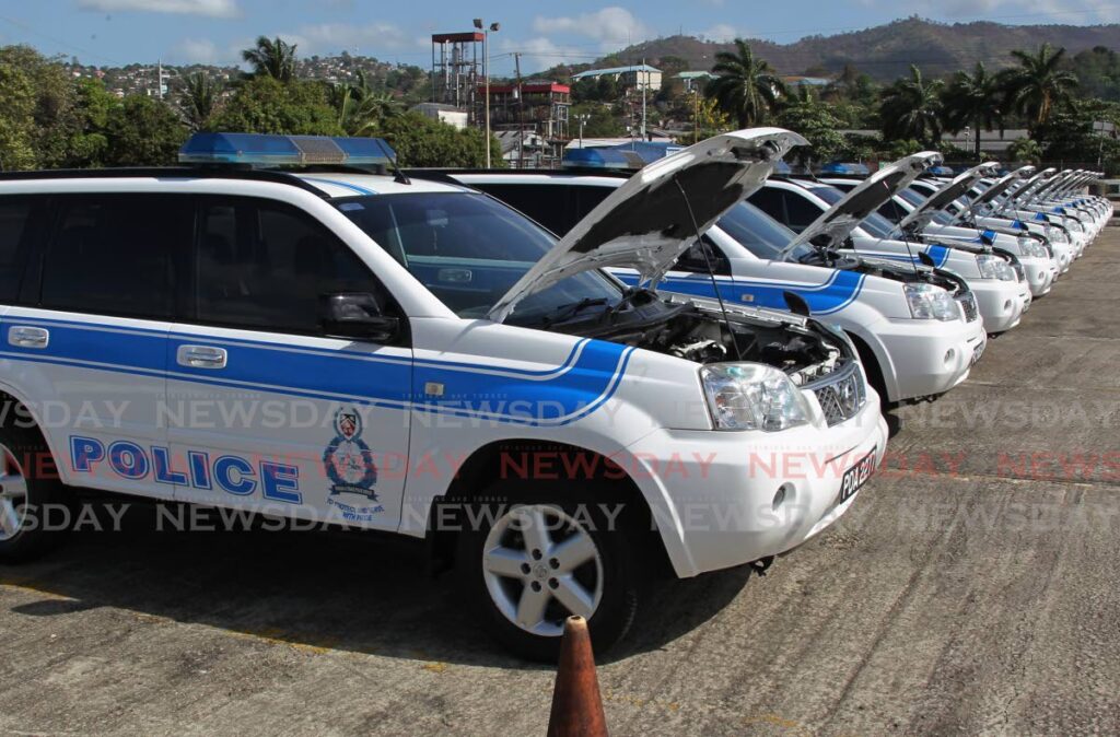 In this file photo, some of the 49 vehicles refurbished by VMCOTT before being handed over to the police in May 2019.  - Photo by Roger Jacob