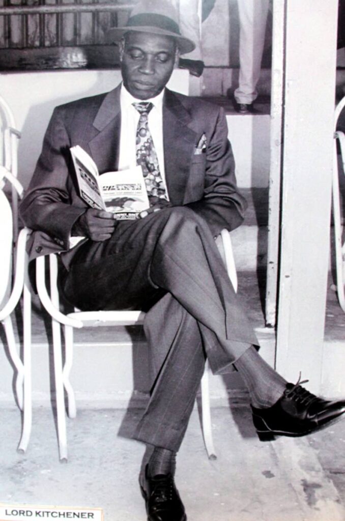 A photo of Lord Kitchener reading at the races on display at the exhibition. Photo by Ayanna Kinsale