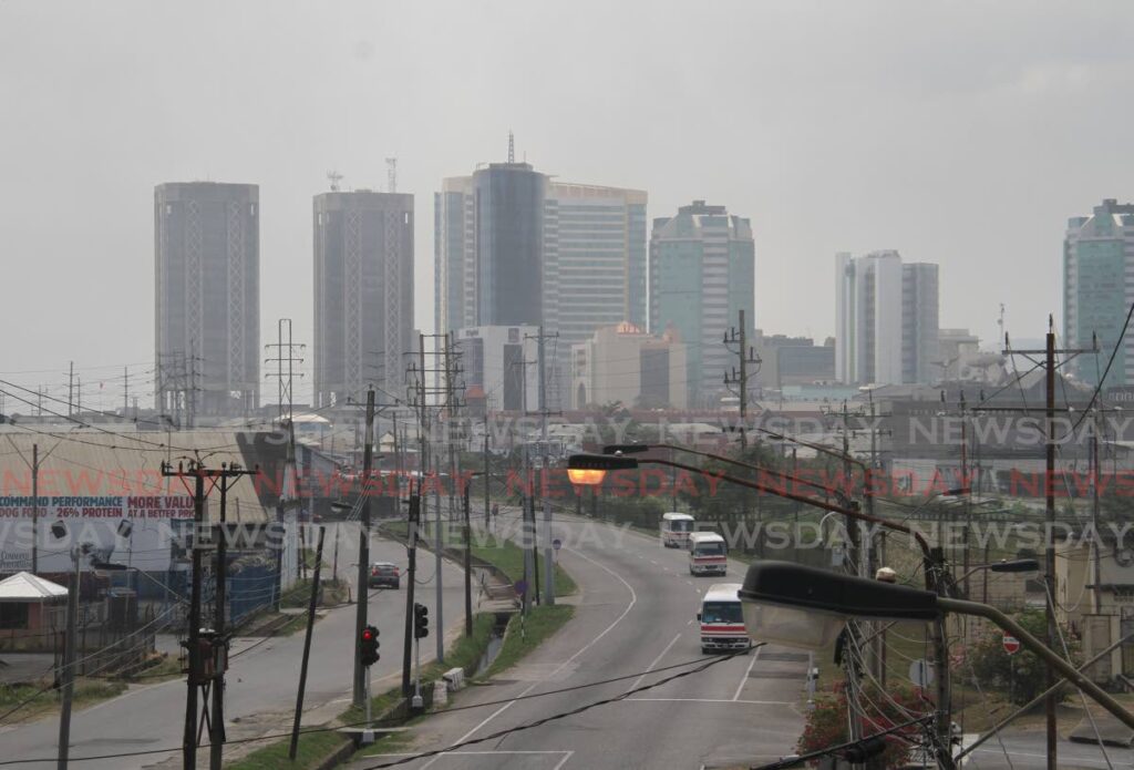 Thick smoke caused by the Beetham dump covers the skyline in Port of Spain earlier this year. - AYANNA KINSALE