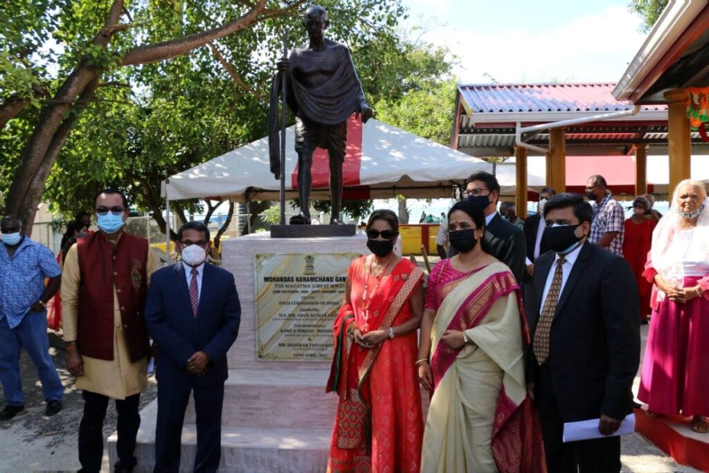 Indian High Commissioner Arun Kumar Sahu, second from left, and Opposition leader Kamla Persad-Bissessar, centre, with officials from the Indian High Commission at the unveiling of the  Mahatma Gandhi statue on April 24 at the Manmohansingh Park in Cedros. - 