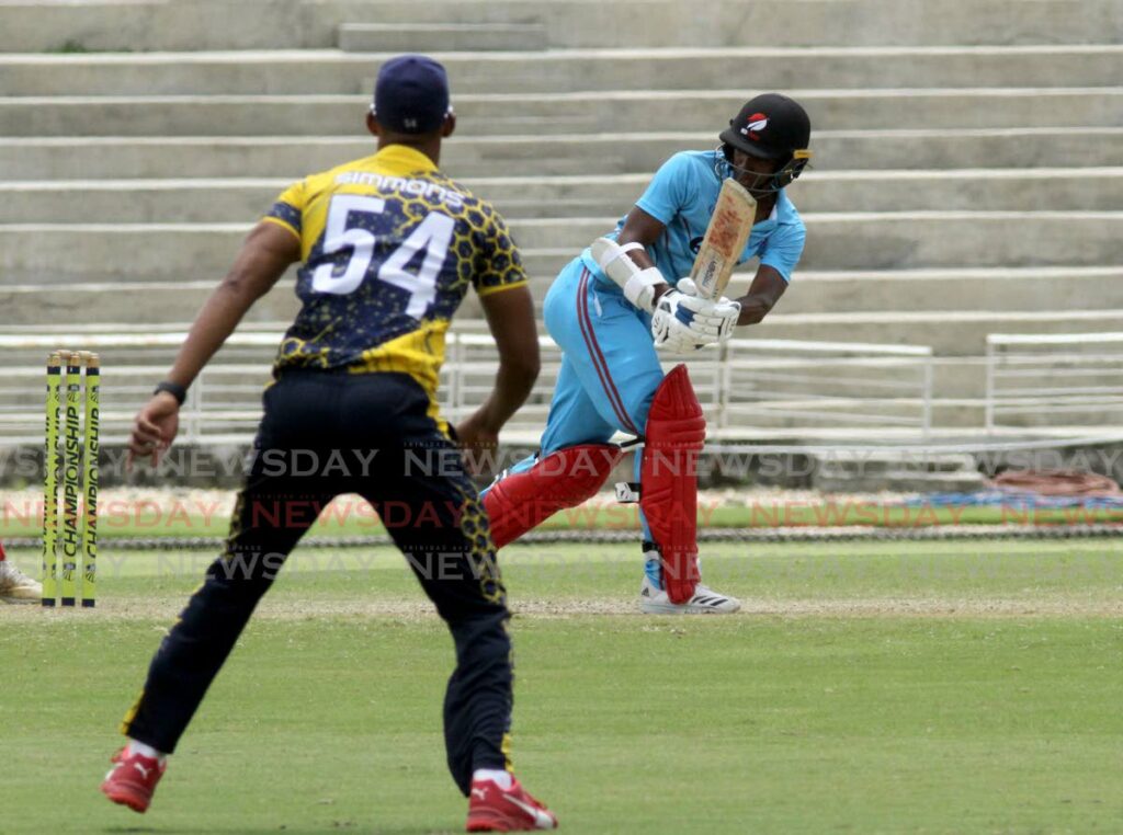 Queen’s Park Cricket Club’s  Jeremy Solozano looks on after playing a shot during the TTCB Premiership I 50-over match against Central Sports, on Sunday. - AYANNA KINSALE