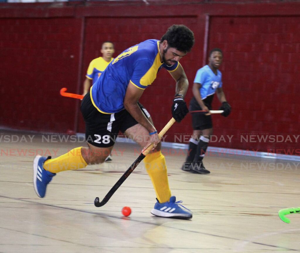 Adam Perriera of Fatima Under-19 in action in the TT Indoor Hockey Festival at Woodbrook Youth Facility. - ROGER JACOB