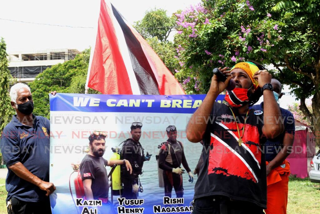Kevin Lalchan, former Petrotrin employee and close friends with the members of the dive team, at the Queen's Park Savannah on Saturday where a motorcade to remember the divers ended.  - ROGER JACOB