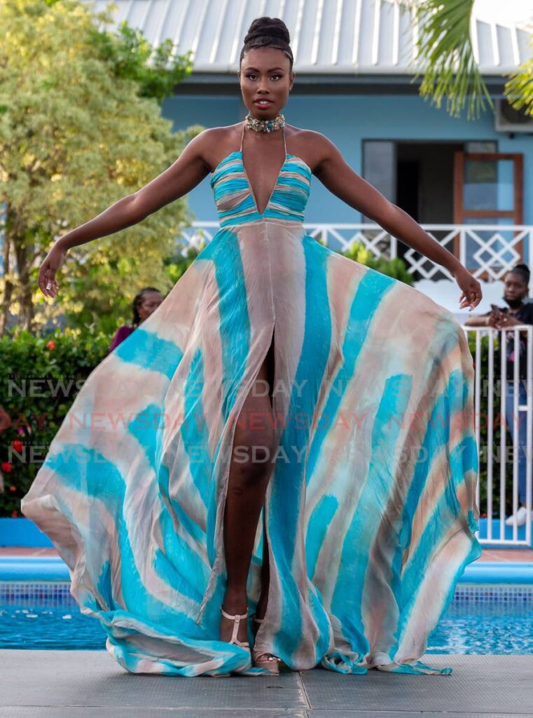 A model displays one of the creations at Keyz Studios' Caribbean Splendor 2022 at Rovanel's Resort, Store Bay Local Road, Bon Accord, Tobago, Sunday. Photo by David Reid