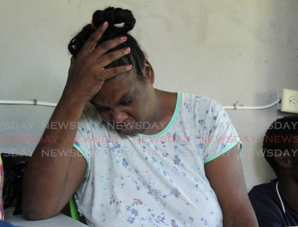 Allyson Mohammed is inconsolable over the death of her daughter Krishana Mohammed who was chopped to death on Wednesday in Guayaguayare. Photo by Ayanna Kinsale