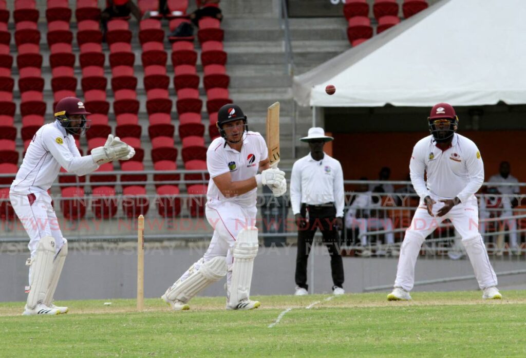 Joshua Da Silva (centre) of the TT Red Force plays a shot through the off-side during his innings of 65 against the Leeward Islands Hurricanes at the Diego Martin Sporting Complex, Diego Martin on Thursday. Photo by Ayanna Kinsale