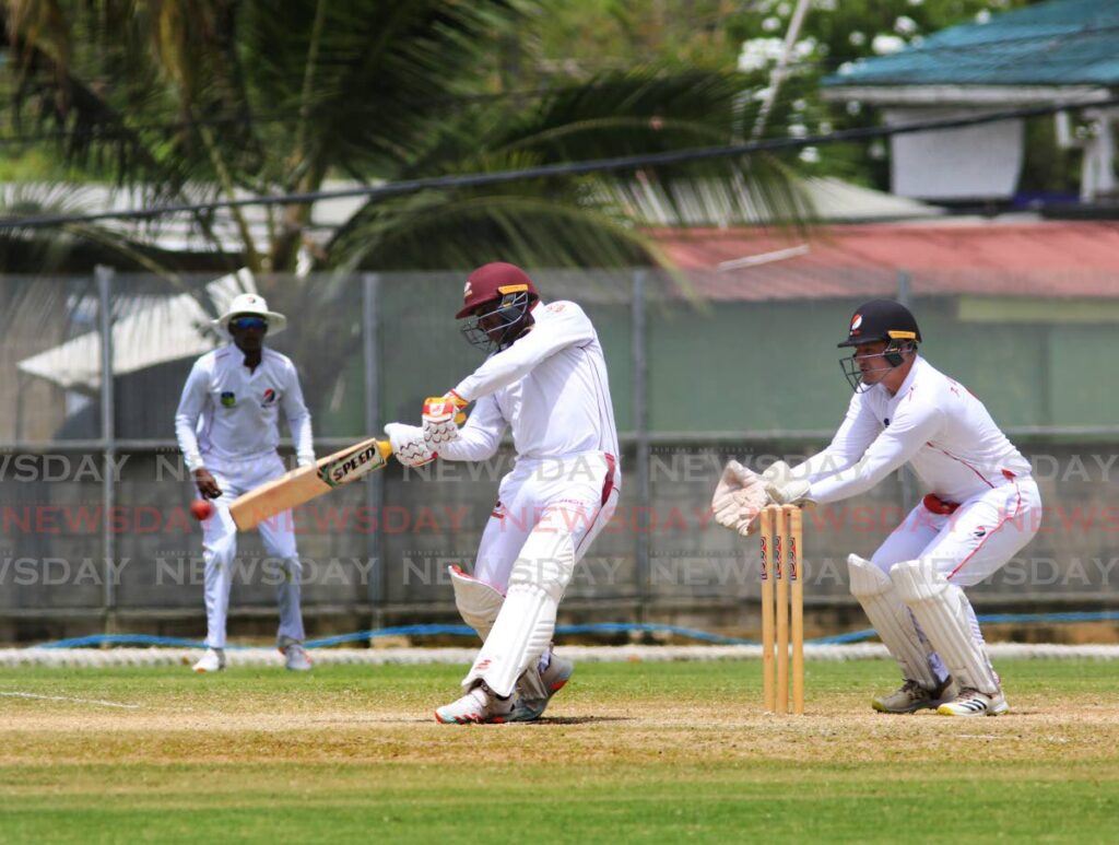 Leewards batsman Devon Thomas on the attack against Red Force at the Diego Martin Sporting Complex on Friday in the West Indies Four-Day Championship.  - SUREASH CHOLAI