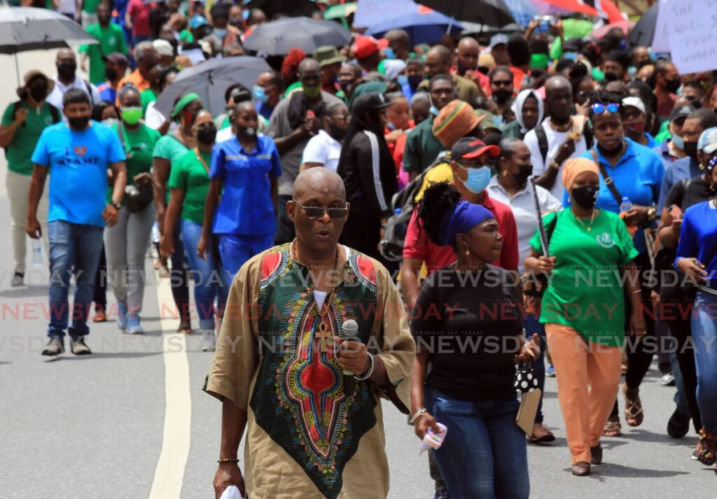 General Secretary of the National Trade Union Centre (NATUC) Michael Annisette leads a protest against government’s two per cent wage increase offer to public sector workers on Friday. Photo by Sureash Cholai