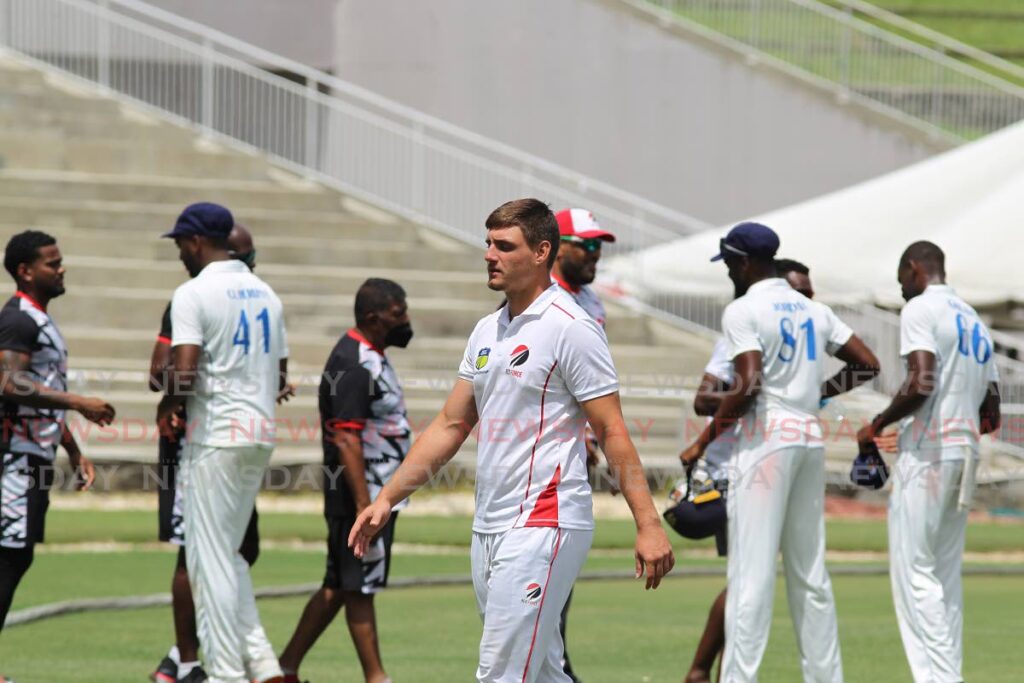 Red Force batsman and wicketkeeper, Joshua Da Silva (C) walks off the field in disappointment as his team lost to the Barbados Pride in the West Indies Four-Day Championship match, at the Brian Lara Cricket Academy stadium in Tarouba on Friday. - Marvin Hamilton
