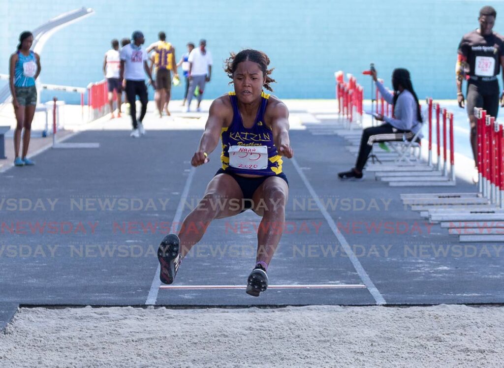 Anya Akili of Kaizen Panthers leaps to victory in the women's long jump at the Kaizen Panthers Paradise Challenge at the Dwight Yorke Stadium on Sunday. - David Reid