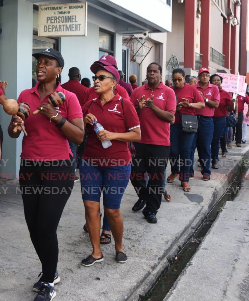 TTUTA members protest outside the Personnel Department, St Vincent Street, Port of Spain during wage negotiations in July 2019. - FILE PHOTO