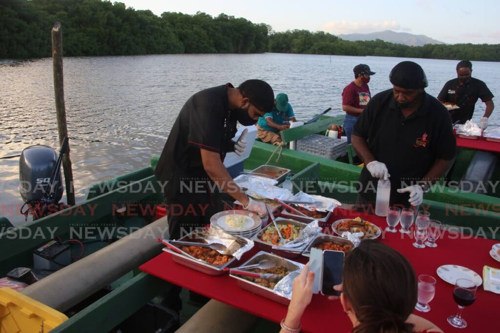 Take dad for dinner and a sunset tour of the Caroni Bird Sanctuary. - Sureash Cholai