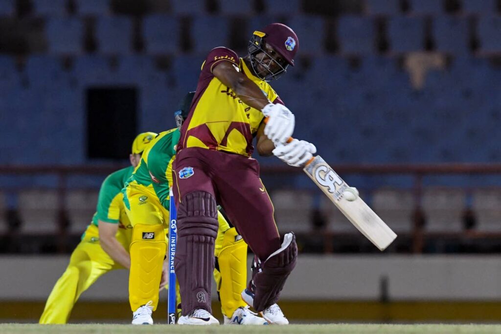 West Indies batsman Evin Lewis hits a six against Australia at the Darren Sammy Cricket Ground, Gros Islet, St Lucia, in 2021. FILE PHOTO - 