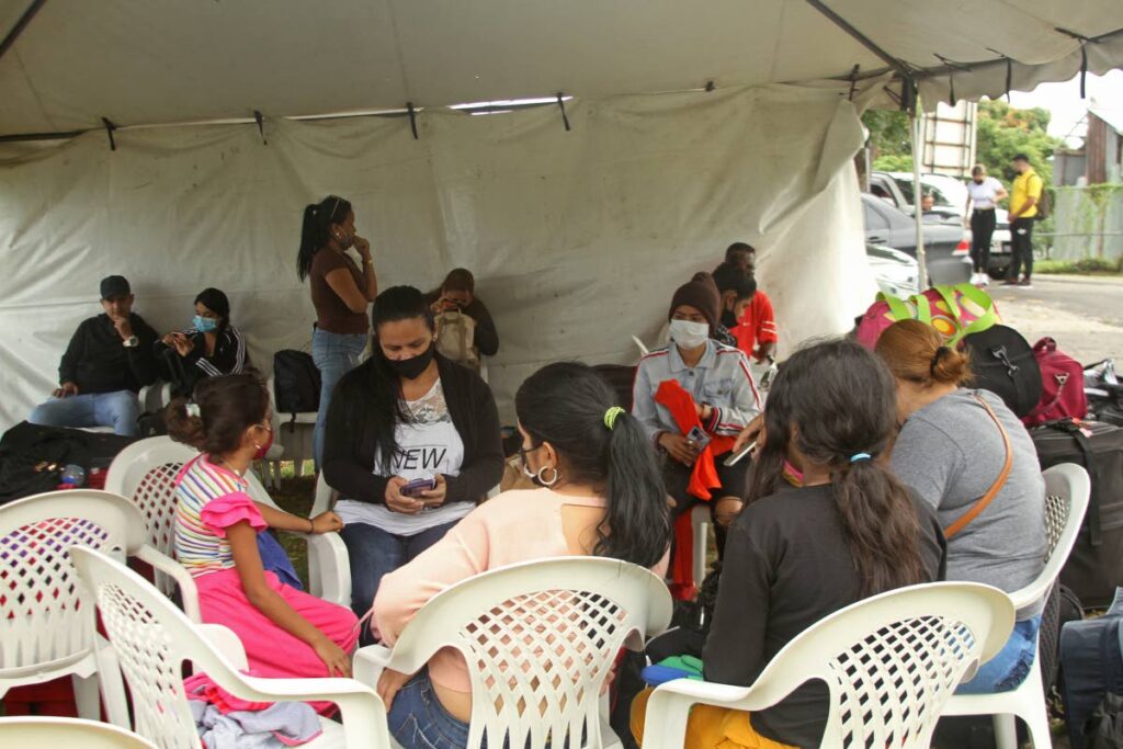File photo: The children of Venezuelan migrants such as these seen waiting to be processed at the port in Cedros, can now access virtual classes online as a programme for this type of learning, has resumed.