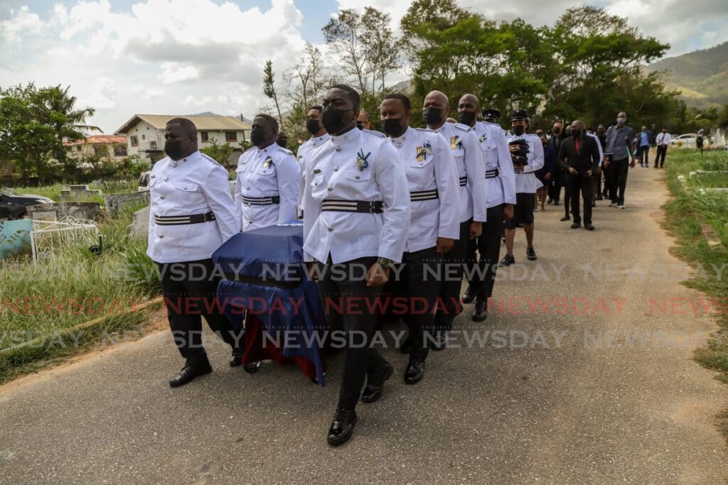 Pallbearers carry the coffin of their colleague Clarence Gilkes, 44, at his funeral service on April 30. Gilkes was shot by a police officer on April 22.  

Photo by Jeff K Mayers