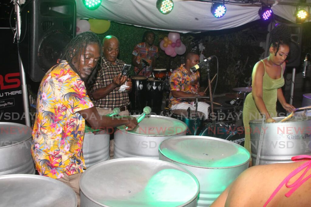 Members of Caribbean Steelpan Connextion entertain the audience at Return of the Secret Garden at Alliance Francaise TT, Alcazar Street, Port of Spain on May 28. - ROGER JACOB