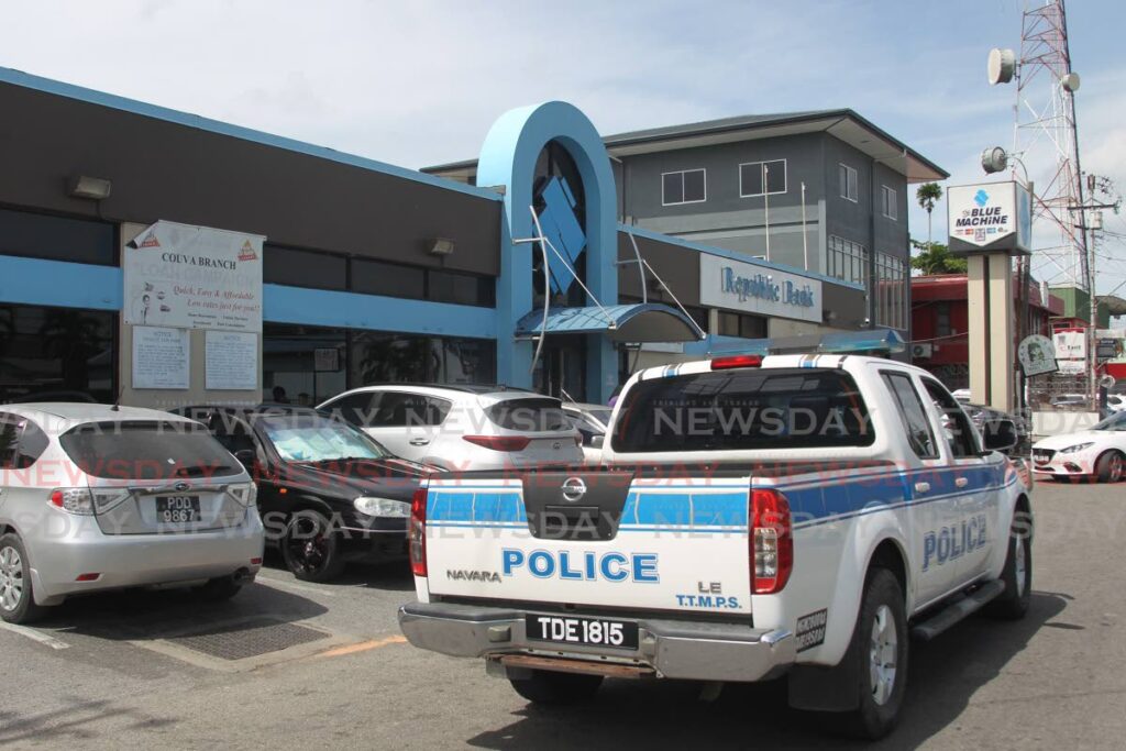 Police on patrol in the carpark of the Republic Bank's Couva branch on Tuesday afternoon. - Marvin Hamilton