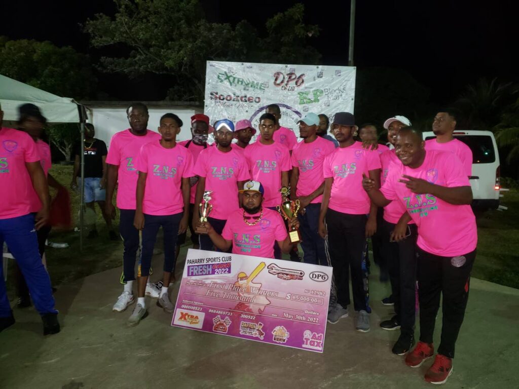 ZNS Construction Crew 1 celebrate winning the Paharry one-day cricket competition in Sangre Grande on Monday.  - Courtesy Paharry Sports Club