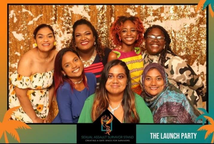 Britney Ramnarine, centre, front row, with supporters of her NGO Sexual Assault Survivors Stand at the launch of an app to help victims on May 25 at Signature Hall, Montrose, Chaguanas. 
Alongside Ramnarine are Arianne Mohammed, left, and Shivana Khan. In the back row, from left, are Angelia Bissoon, Cherelle Mahabir, Zion McNeil and Ashley Ragbir.   