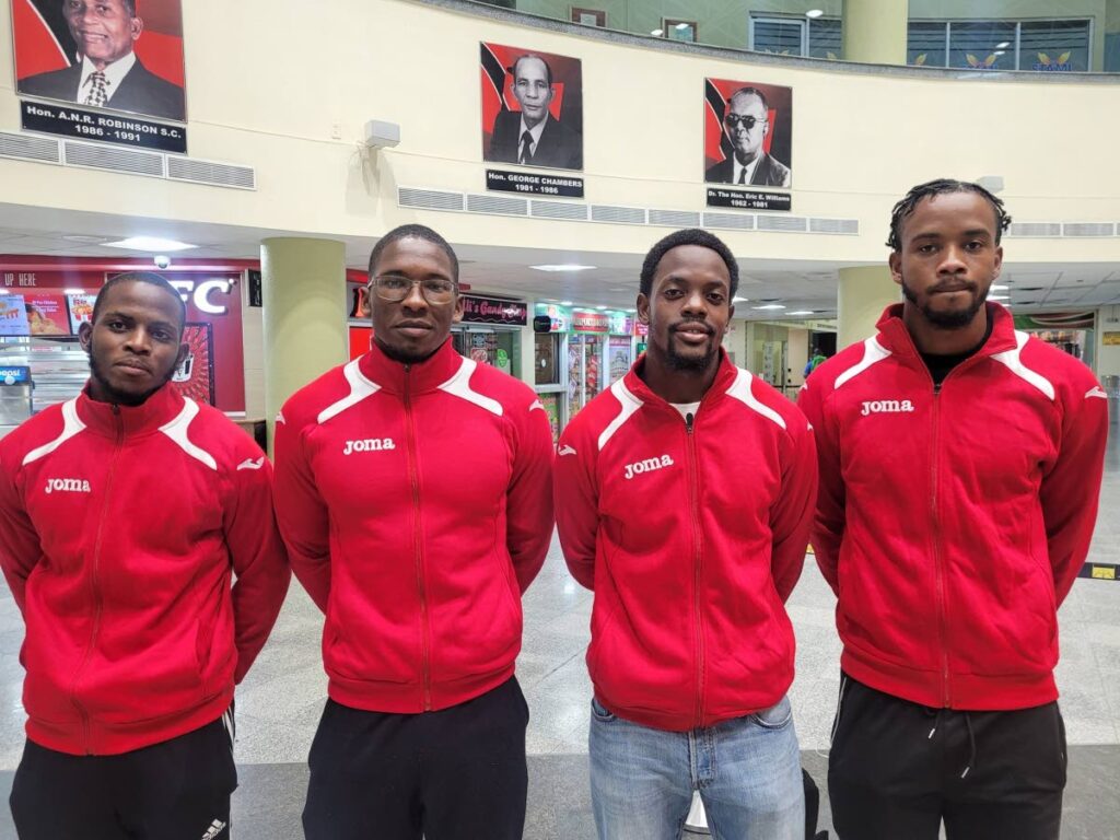 UTT athletes (from left) Tyla Austin, Rogill Torres, Matthew Graham and Nathan Farinha at the Piarco International Airport ahead of their trip to Grenada.  