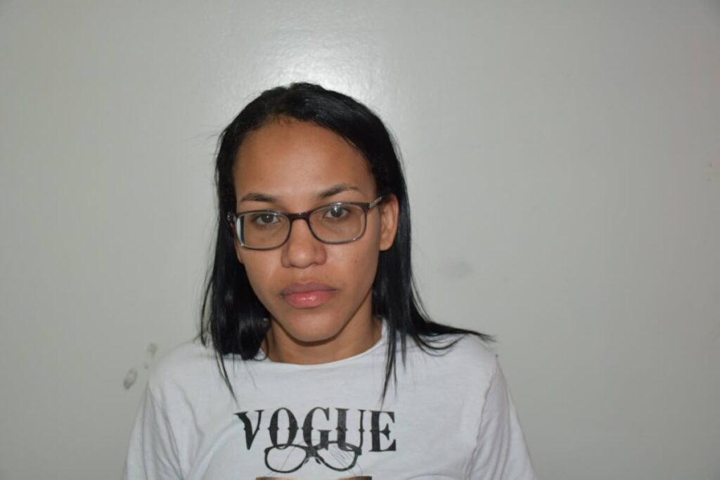 Nathaly Gomez Leandres, 21, of Tacarigua, was charged with two counts of being a gang leader, one count of trafficking in children and inciting a child to become a prostitute. 

PHOTO COURTESY TTPS - PHOTO COURTESY TTPS
