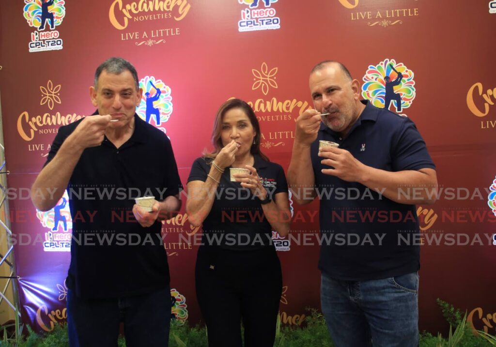 (Left to right) HADCO director Paul Gabriel, CPL head of branding and hospitality Natalie Black O’Connor and Hadco director Robert Hadad enjoy some ice cream, on Thursday, during a press conference held at the Diamond Vale Industrial Estate, Diego Martin. - SUREASH CHOLAI