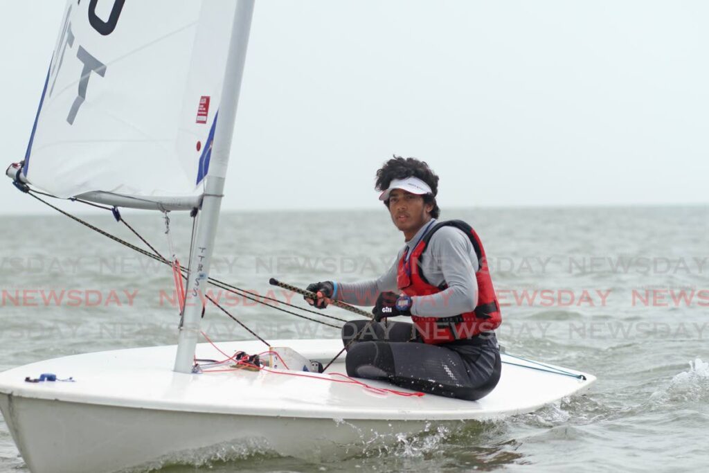 Athlete Stefan Stuven races in the National Sailing Championship at Vessigny beach on Saturday. - Marvin Hamilton