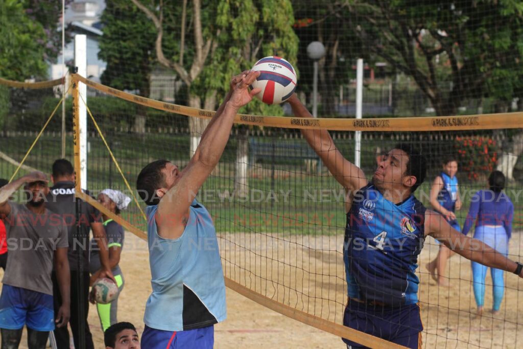 Jesus Limpio (right), men's captain of Challengers Volleyball Club, in a practice match at Saith Park, Chaguanas. - Marvin Hamilton
